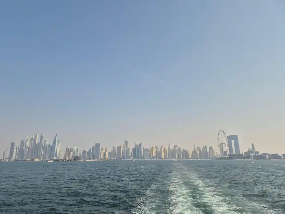 The skyline seen over the yacht's wake