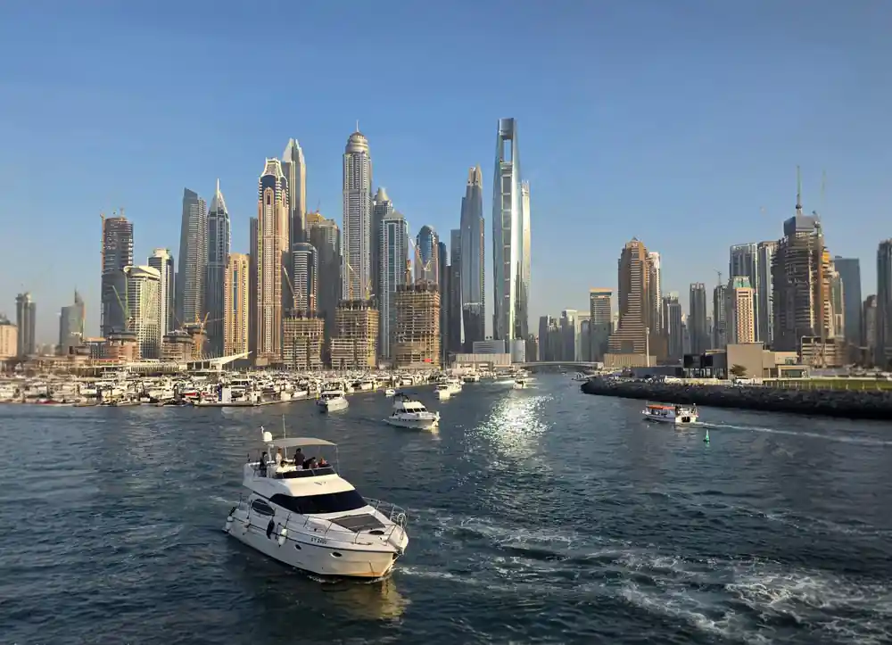 Yachts and the Marina towers in afternoon light